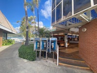 a building with a phone booth in front of it